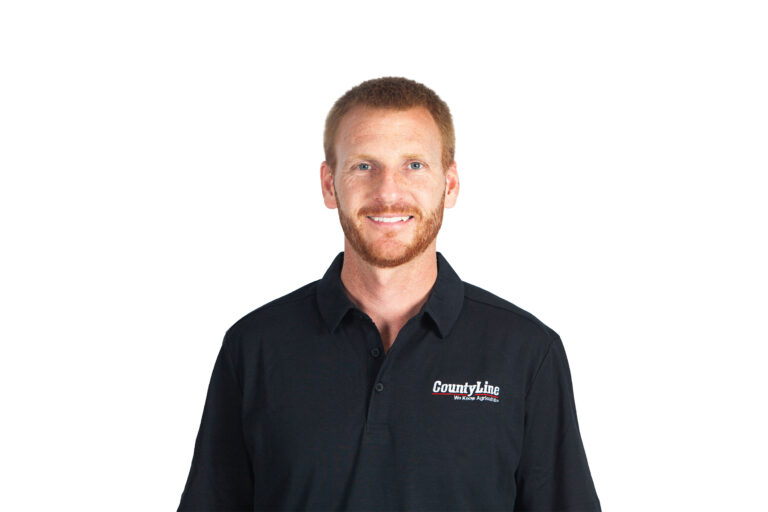Male, Caucasian, Black polo shirt with CLE logo, Red hair, beard and moustache