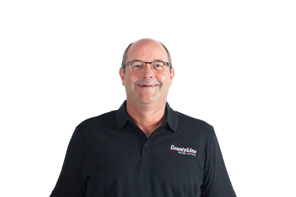 Male, Caucasian, Black polo shirt with CLE logo, Balding with glasses, laughing smile