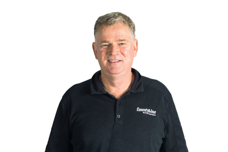 Male, Caucasian, Black polo shirt with CLE logo, Salt and pepper hair