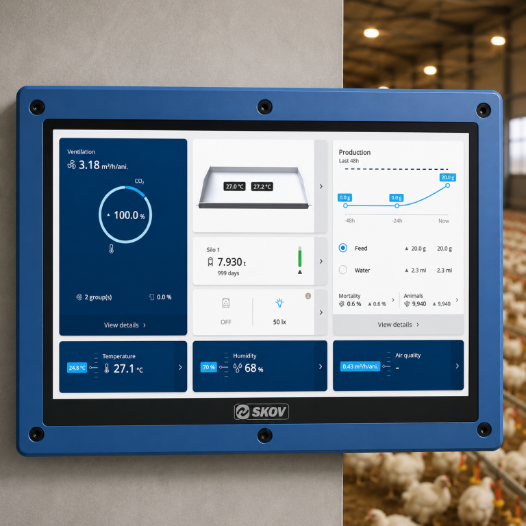 SKOV BlueControl climate controller with touchscreen display in a poultry barn