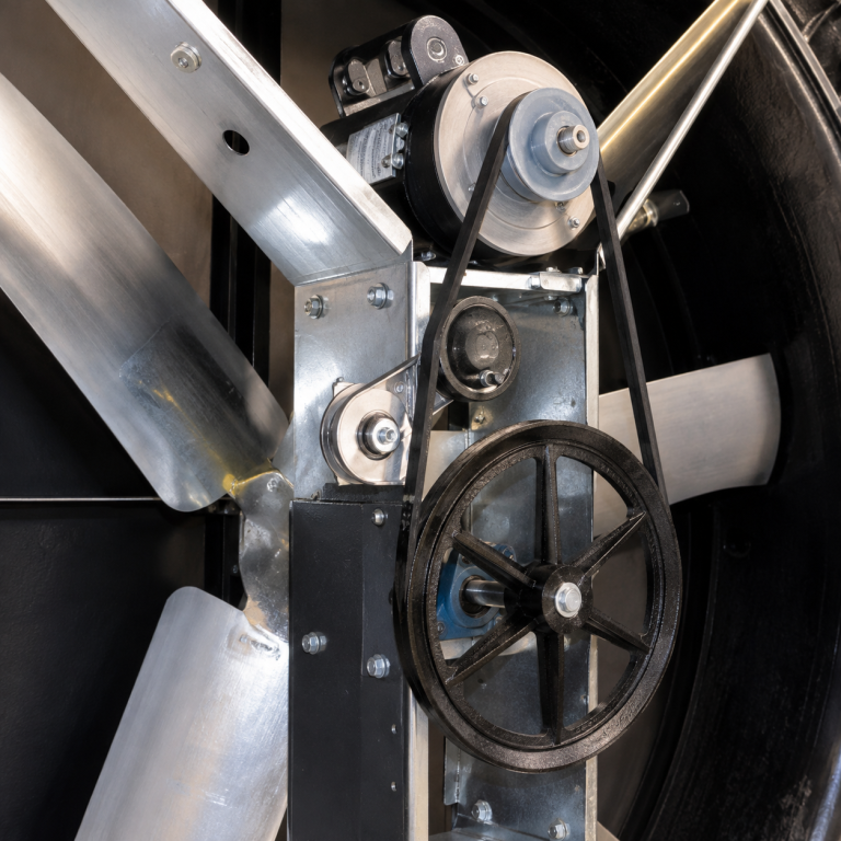 Close-up of Cumberland Mega Flow 58C 58 inch fiberglass poultry fan drive and belt assembly
